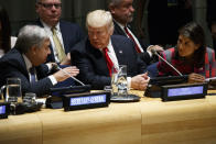 President Donald Trump, center, and U.S. Ambassador to the United Nations Nikki Haley, right, talk with United Nations Secretary General Antonio Guterres at the United Nations General Assembly, Monday, Sept. 24, 2018, at U.N. Headquarters. (AP Photo/Evan Vucci)