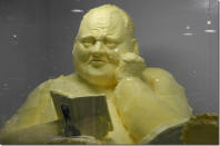 Using nearly 230-kilograms of butter, Olenka Kleban built her sculpture of Toronto Mayor Rob Ford as part of a "CNE tradition that involves a group of artists spending several days inside a box chilled to about 8 degrees Celsius, sculpting creations according to an agreed-upon theme," reports the <a href="http://www.thestar.com/news/gta/article/1246373--cne-masterpiece-a-well-buttered-ford-reading-atwood-leaning-on-a-steering-wheel" rel="nofollow noopener" target="_blank" data-ylk="slk:Toronto Star;elm:context_link;itc:0;sec:content-canvas" class="link ">Toronto Star</a>. The butter sculpture became an instant hit as it features Toronto's controversial mayor reading a Margaret Atwood book while leaning against a steering wheel.