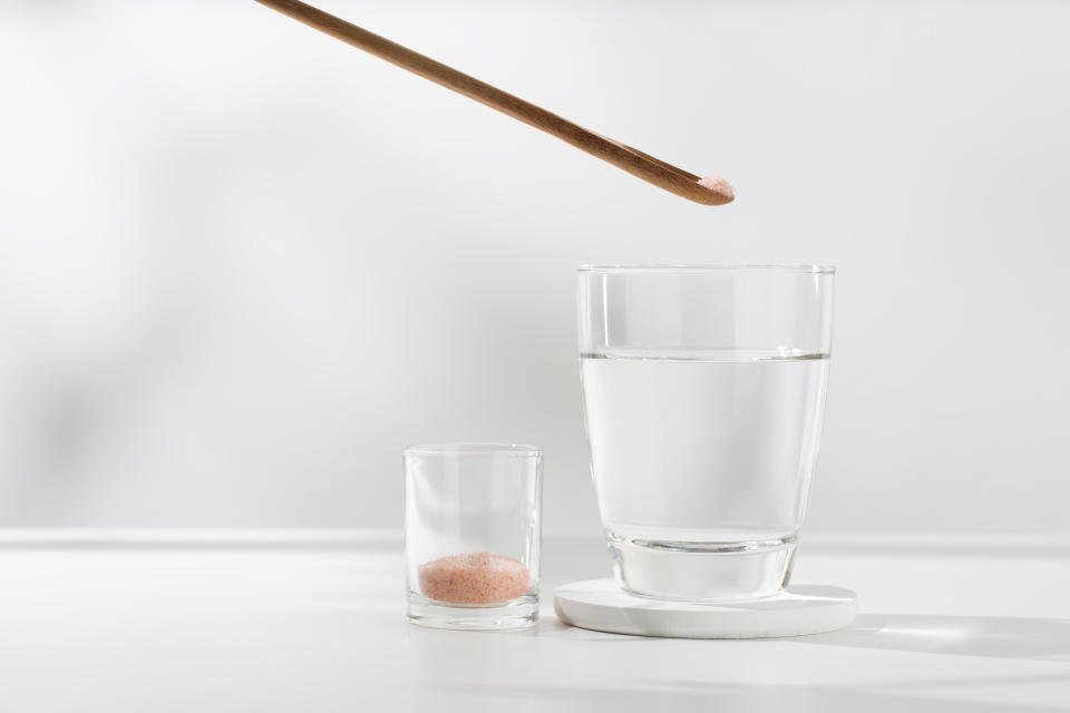 Mix pink himalayan mineral salt to drinking water for health. Drinking a mix of salt and water can help rehydrate the body. (Photo via Getty Images)