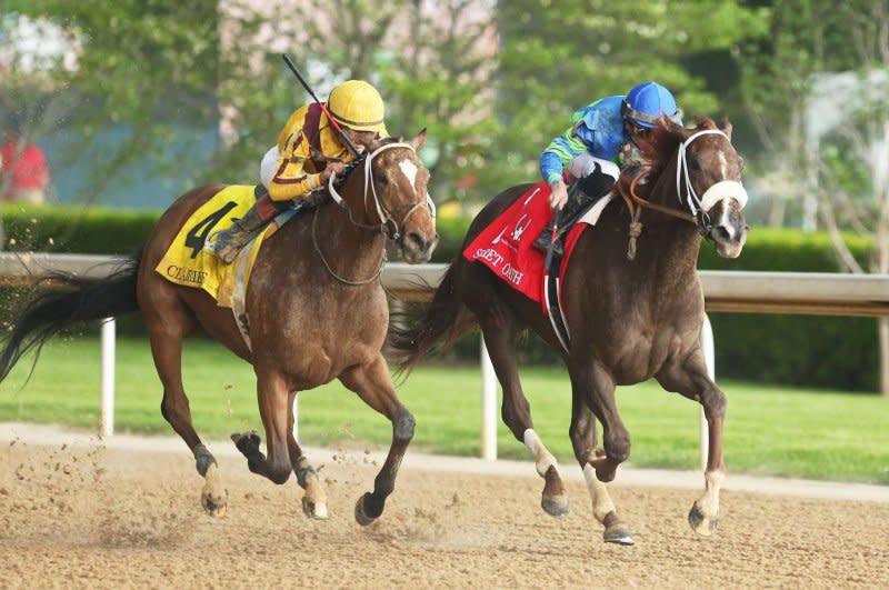 Clairiere (L), shown winning the Grade I Apple Blossom at Oaklawn Park, meets Nest in Sunday's Shuvee Stakes at Saratoga. Coady Photography, courtesy of Oaklawn Park