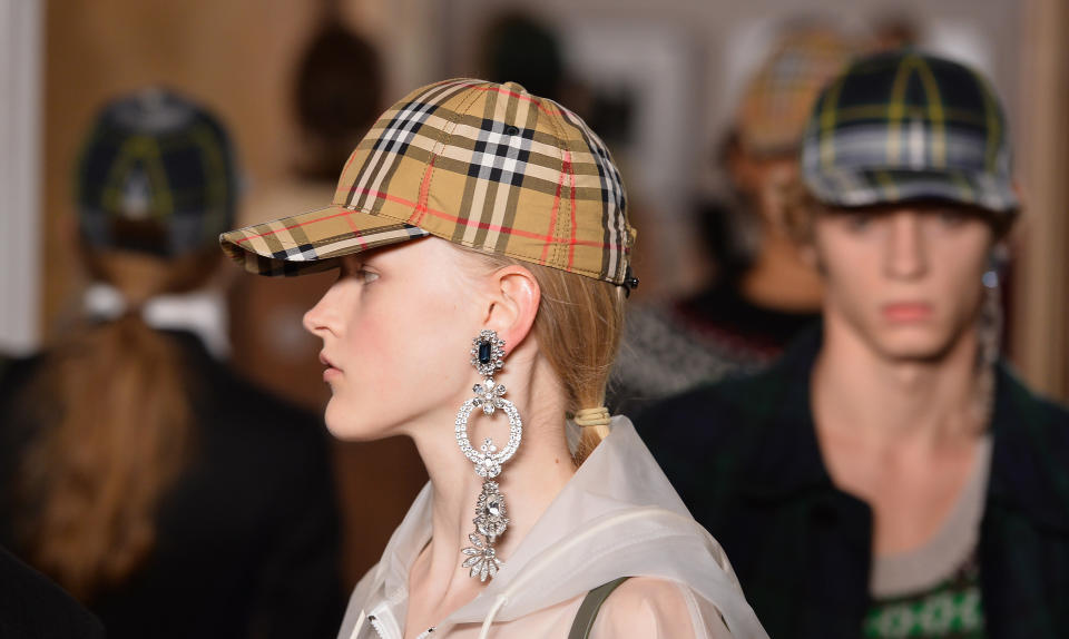 Close-up of the monocle crystal chandelier earrings from the Burberry September 2017 show. (Photo: Getty Images)