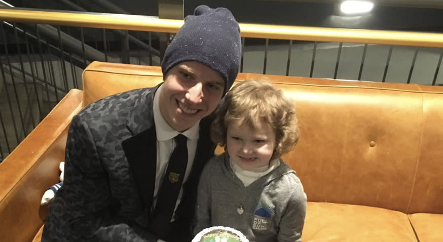 Mitch Marner and Hayden Foulon pose with the young Leafs fan’s birthday cake after Toronto’s win over Buffalo on Saturday night. (Twitter//@Zeisberger)