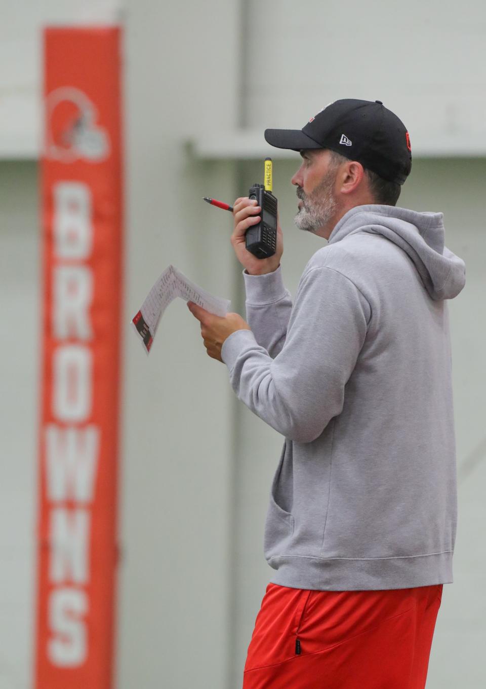 Cleveland Browns head coach Kevin Stefanski calls in plays for the offense during training camp on Wednesday, July 27, 2022 in Berea.