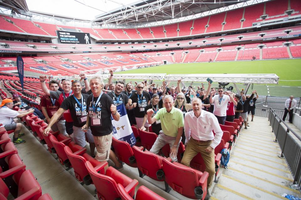 All together now: Sir Geoff Hurst and Ray Clemence join the other Wembley heroes