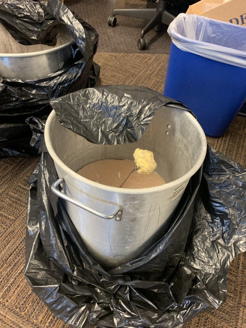 Traffickers used these buckets to melt wax and extract meth hidden in candles.