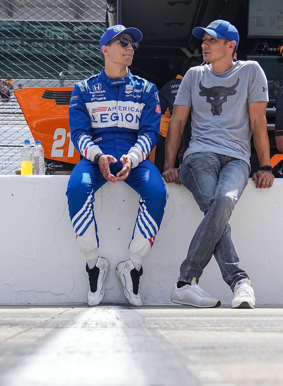 Chip Ganassi Racing driver Alex Palou (10) sits on the wall with his father Ramon Palou before the start of the Gallagher Grand Prix on Saturday, July 30, 2022 at Indianapolis Motor Speedway in Indianapolis. 