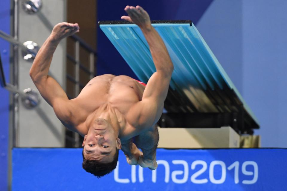 Mexico's Juan Celaya competes in the Men's 3m Springboard final of the Diving competition, during the Lima 2019 Pan-American Games in Lima on August 4, 2019. (Photo by PEDRO PARDO / AFP)        (Photo credit should read PEDRO PARDO/AFP/Getty Images)