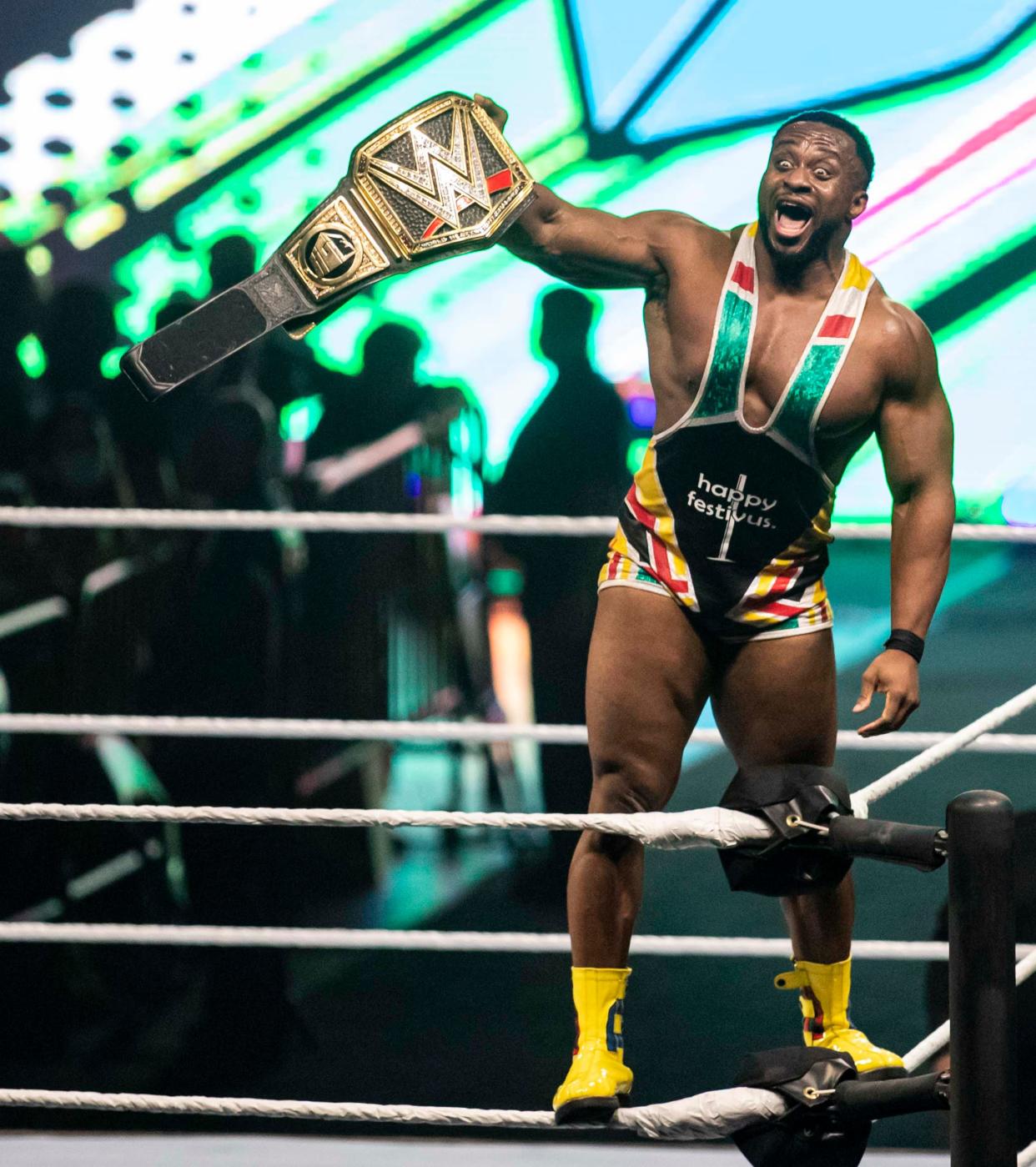 WWE superstar Big E shows off his championship belt on Saturday, Dec. 18, 2021, at the BMO Harris Bank Center in Rockford.