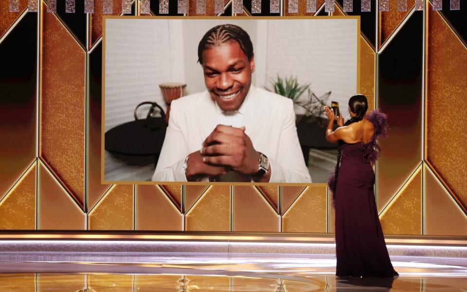 John Boyega accepts the Best Supporting Actor - Television award - Getty Images