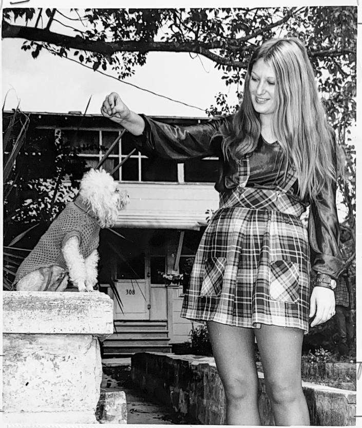 Shirley Wheeler with her dog Crystal by her Daytona Beach apartment in 1971.