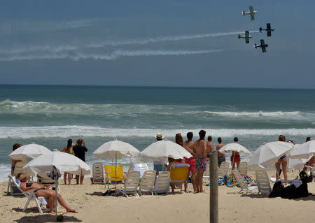 Airplanes perform for Brazil's new president-elect Jair Bolsonaro (not pictured) near his condominium at Barra da Tijuca neighbourhood in Rio de Janeiro, Brazil October 31, 2018. REUTERS/Lucas Landau