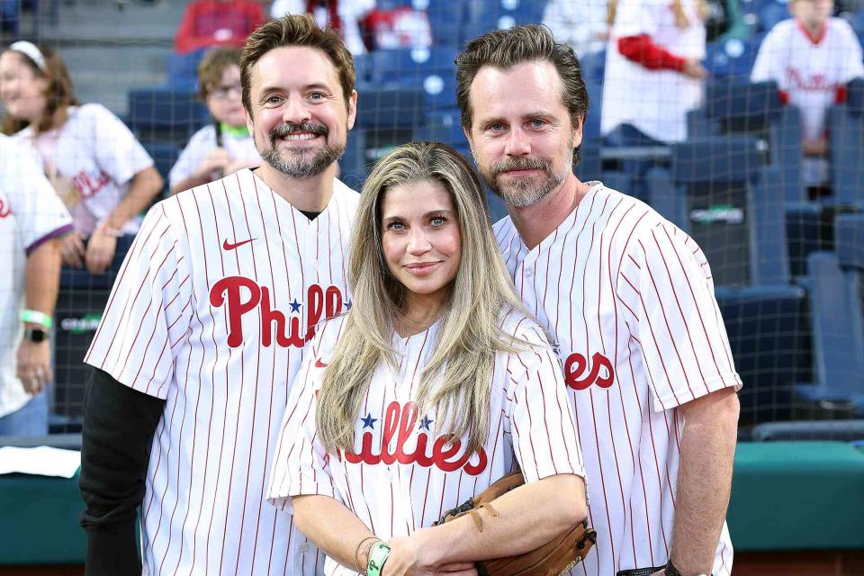 <p>Tim Nwachukwu/Getty</p> (L-R) Will Friedle, Danielle Fishel and Rider Strong pose for a photo during a game between the Philadelphia Phillies and the Pittsburgh Pirates at Citizens Bank Park on September 27, 2023 in Philadelphia, Pennsylvania. 