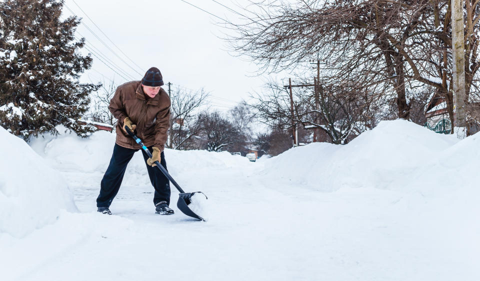 Shovelling snow can increase your risk of heart attack. (Image via Getty Images)