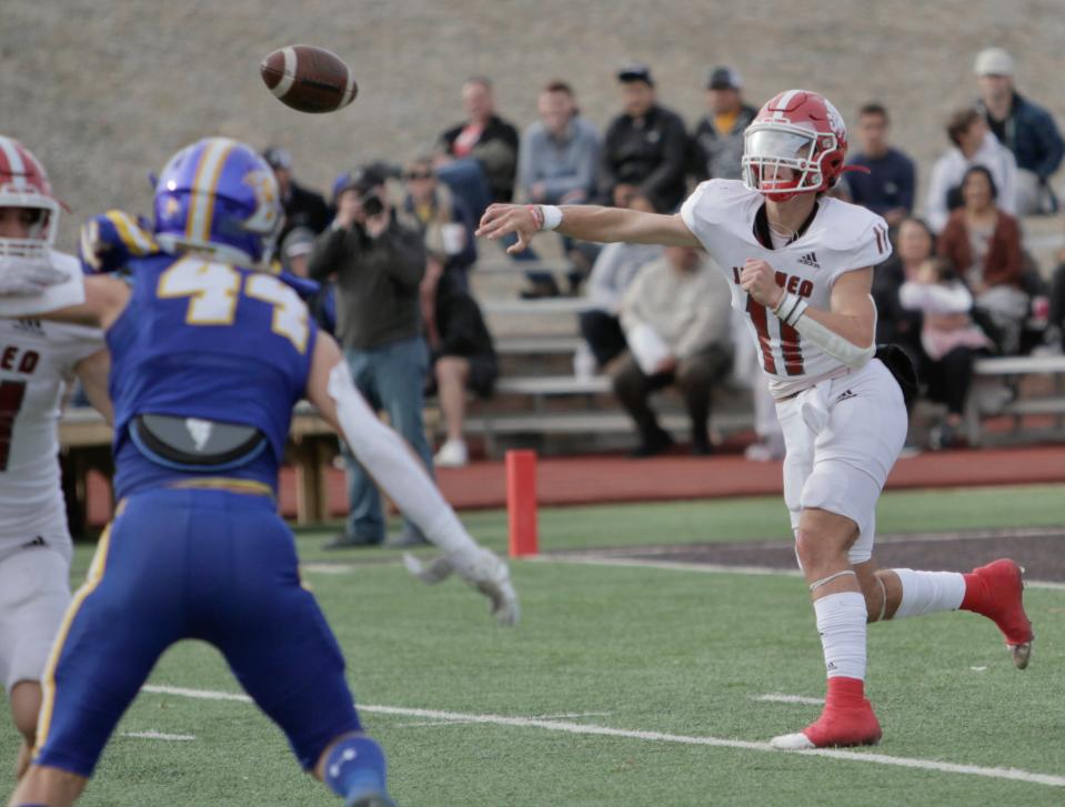 Jim Ned quarterback Tate Yardley throws a pass downfield against Brock in the regional semifinals.