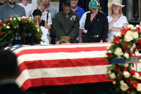 Mourners file past the casket of Senator McCain who lies in state in the Rotunda at the U.S. Capitol in Washington, U.S., August 31, 2018. REUTERS/Mary F. Calvert