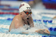 FILE - Lilly King competes in a women's 200-meter breaststroke semifinal during wave 2 of the U.S. Olympic Swim Trials in Omaha, Neb., in this Thursday, June 17, 2021, file photo. King stirred up the already heated rivalry with the Australians by making a bold prediction for the U.S. women at the Tokyo Aquatics Center. (AP Photo/Charlie Neibergall, File)