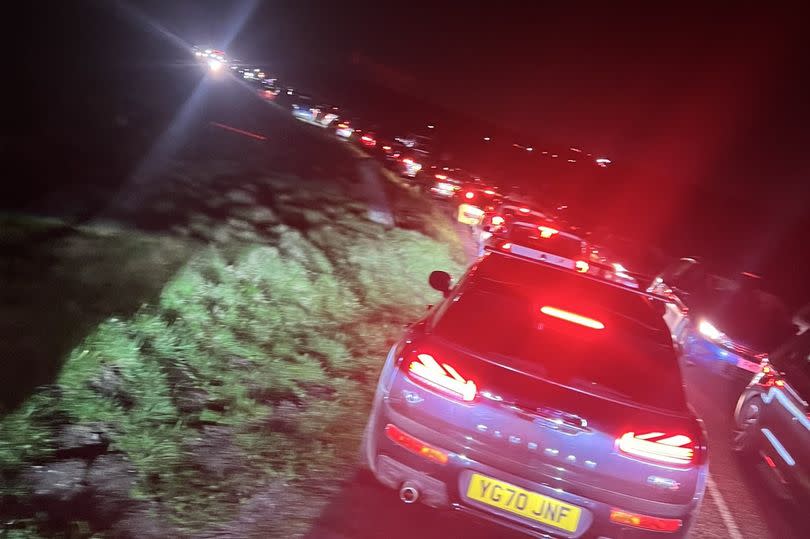 Cars queue in the Peak District on Saturday night