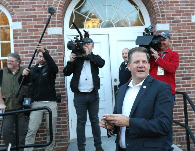 Gov. Chris Sununu votes in the small Seacoast town of Newfields, where he is a resident along with Sen. Maggie Hassan, a former governor of New Hampshire who is also seeking reelection, Tuesday, Nov. 8, 2022.