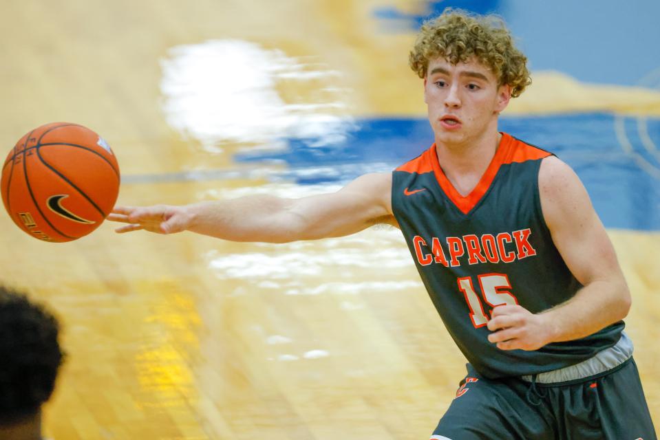 Caprock’s Lleyton Brown (15) passes the ball during the team’s basketball game against Frenship in the Gene Messer Classic on Thursday, Dec. 2, 2021 at the Tiger Pit in Wolfforth, Texas.