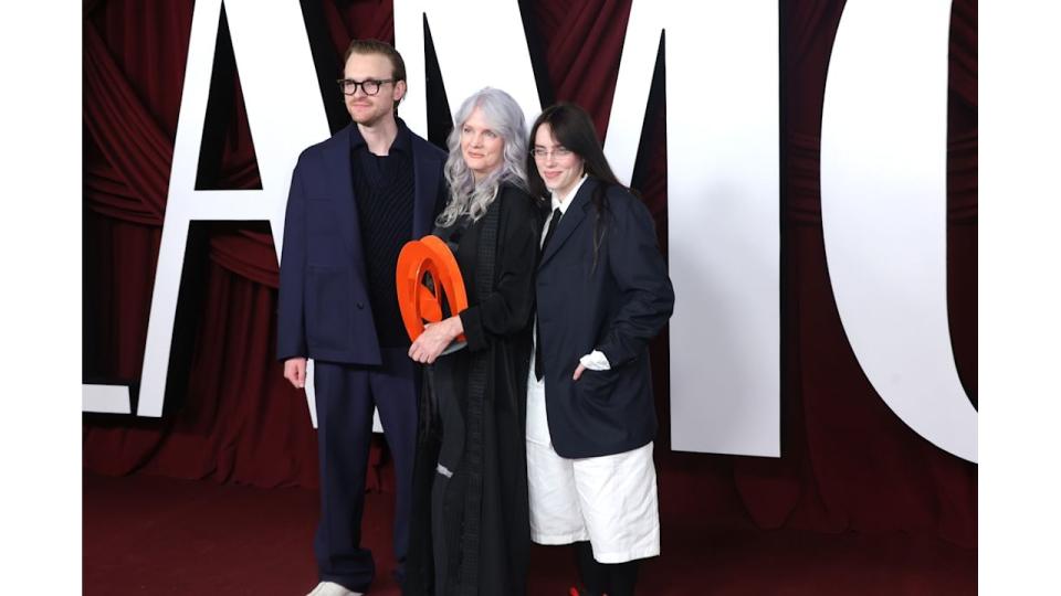 billie eilish in pinstripes with baggy shorts