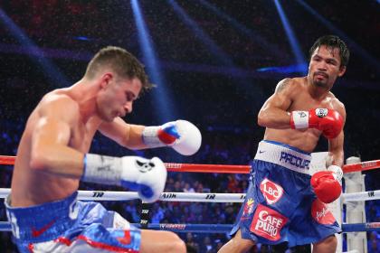 Manny Pacquiao knocks down Chris Algieri during their WBC title fight. (Getty)