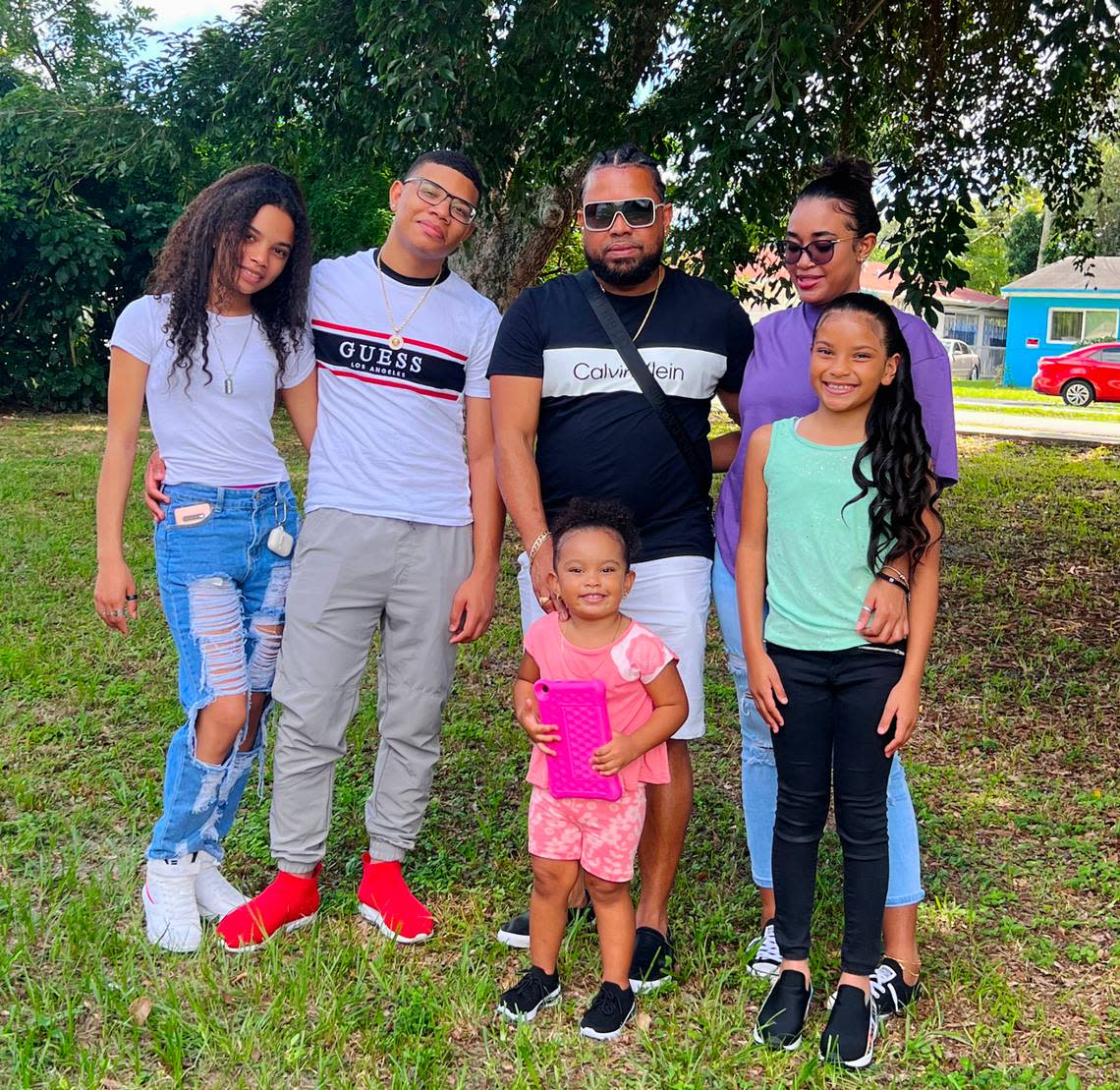 Cristiàn Batista (middle) with his five kids: Steicy, Cristal, Nashly, Erick, and Lesly outside their house in Hollywood.