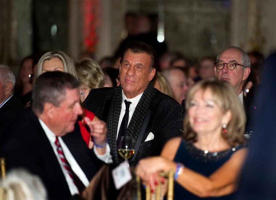 Actor Robert Davi will attend the Trumpettes' gala at Mar-a-Lago on Super Bowl weekend in February. Davi, center, is seen here on Jan. 18, 2018 at Mar-a-Lago attending a celebration honoring the first anniversary of Donald Trump's inauguration. Trump's son, Eric Trump, introduced Davi as "the bad guy from the movie Goonies."