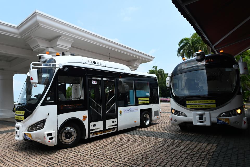 On-demand autonomous shuttle buses are seen during the official launch of a public trial run at Sentosa island resort in Singapore on August 20, 2019. - Singapore will next week begin a public trial of driverless buses that can be booked with an app, part of ambitions to roll out autonomous vehicles across the city-state. (Photo by Roslan RAHMAN / AFP)        (Photo credit should read ROSLAN RAHMAN/AFP/Getty Images)