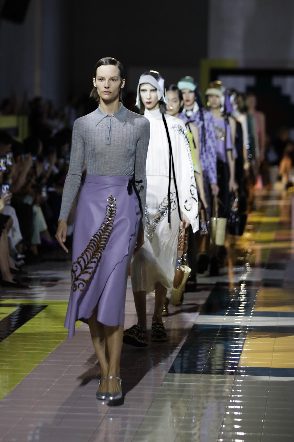 Models wear creations as part of the Prada Spring-Summer 2020 collection, unveiled during the fashion week, in Milan, Italy, Wednesday, Sept. 18, 2019. (AP Photo/Luca Bruno)