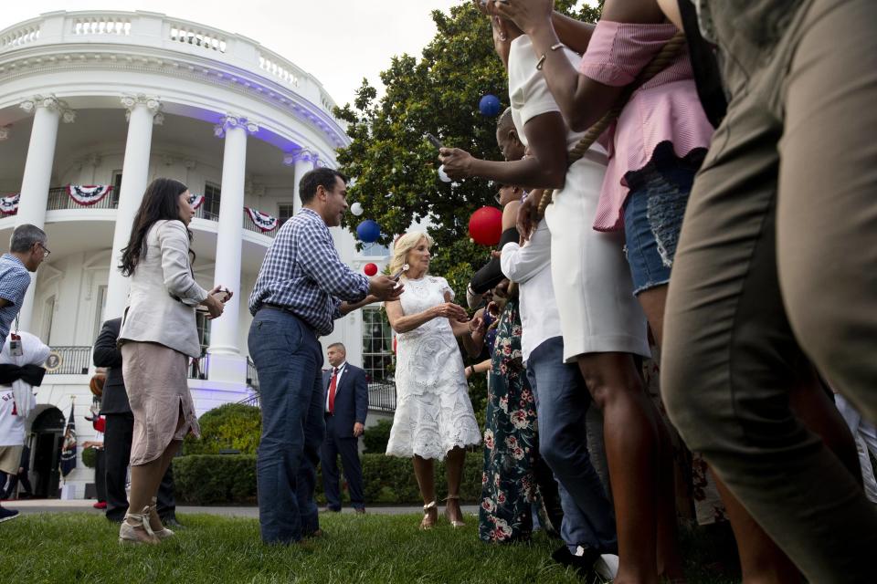 Jill Biden greets guests at an Independence Day party on the South Lawn of the White House. - Credit: Michael Reynolds - Pool via CNP / MEGA