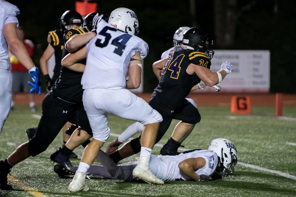 Palisades running back Steven Lilly carries the ball for a 14-yard touchdown run against Tamaqua, on Friday, October 8, 2021, at Walt Snyder Stadium in Kitnersville. The Pirates defeated the Raiders 35-7.