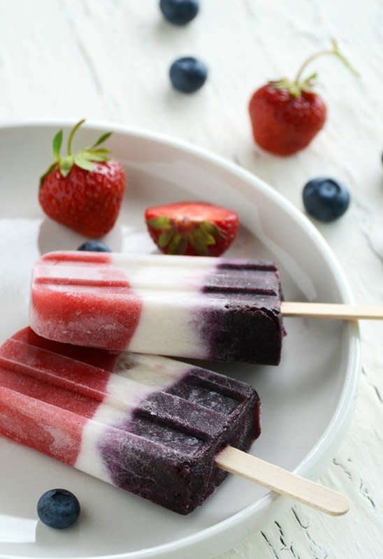 <p>An Edible Mosaic</p><p>Pretty and refreshing red, white, and blue popsicles that are perfect for summertime celebrations! <a href="http://www.anediblemosaic.com/double-berry-coconut-pops-no-added-sugar/" rel="nofollow noopener" target="_blank" data-ylk="slk:Click HERE for recipe;elm:context_link;itc:0;sec:content-canvas" class="link "><strong>Click HERE for recipe</strong></a>.</p>