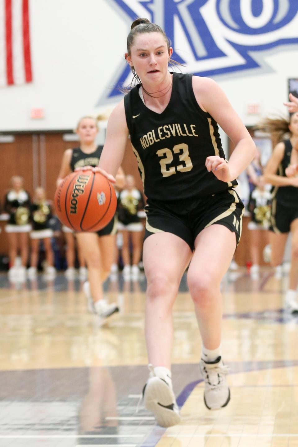 Noblesville Meredith Tippner (23) brings the ball down court as Noblesville takes on Fishers High School in the S8 IHSAA Class 4A Girls Basketball State Semi-finals; Feb 2, 2024; Fishers, IN, USA; at Hamilton Southeastern High School.