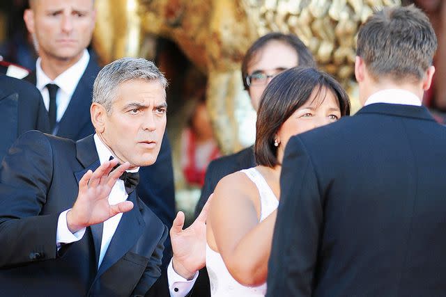 <p>ALBERTO PIZZOLI/AFP/Getty</p> George Clooney and Brad Pitt in 2008