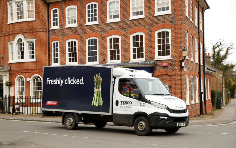 FILE PHOTO: A Tesco delivery van is seen as the number of coronavirus cases grow around the world