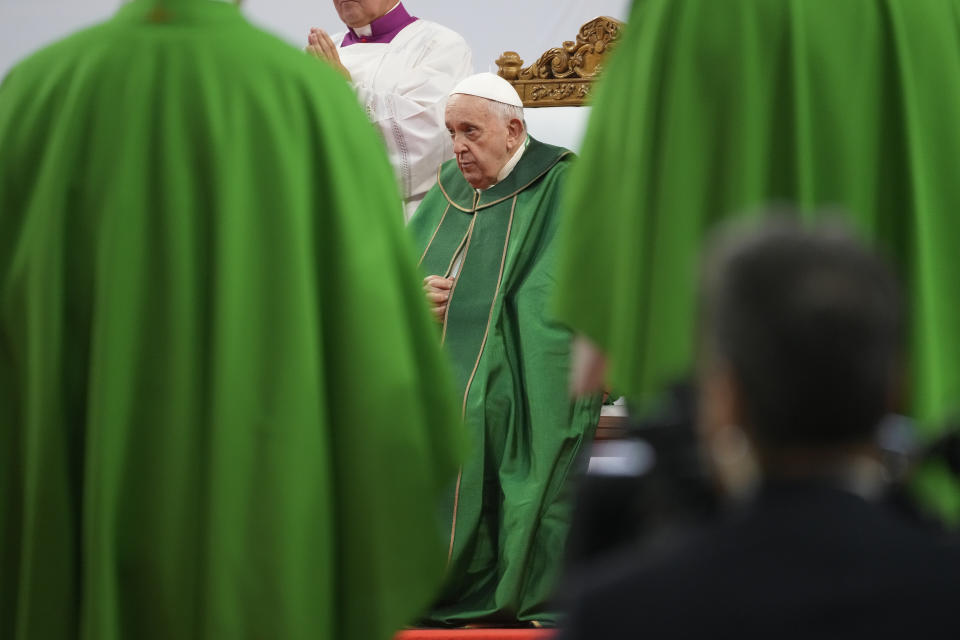 Pope Francis presides over a mass at the Steppe Arena in the Mongolian capital Ulaanbaatar, Sunday, Sept. 3, 2023. Francis is in Mongolia to minister to one of the world's smallest and newest Catholic communities. Neighboring China's crackdown on religious minorities has been a constant backdrop to the trip, even as the Vatican hopes to focus attention instead on Mongolia and its 1,450 Catholics. (AP Photo/Andrew Medichini)