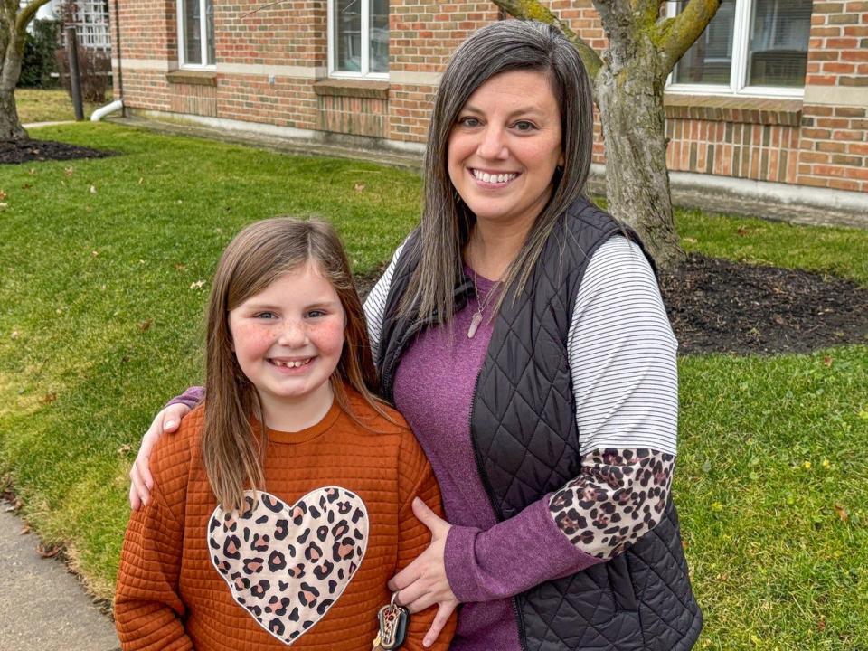 Cleah Briggs, right, helped her daughter, Lucy Briggs, paint and hide rocks around Oak Harbor. The project helped Lucy earn a Girl Scout badge.