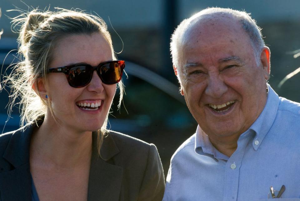 Marta Ortega with her father, Amancio Ortega, 85, who launched Inditex back in 1963 and is today Spain's richest individual  (AFP via Getty Images)