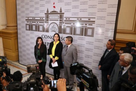 Lawmakers from the Popular Force Party (Partido Fuerza Popular) Alejandra Aramayo, Ursula Letona and Luis Galarreta speak to the media after Peru's President Martin Vizcarra asked the Congress for a new vote of confidence in his Cabinet in Lima, Peru, September 17, 2018. REUTERS/Guadalupe Pardo