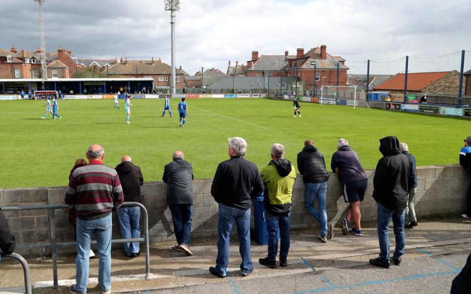 A small number of spectators are allowed into the Towbar Express Stadium - PA