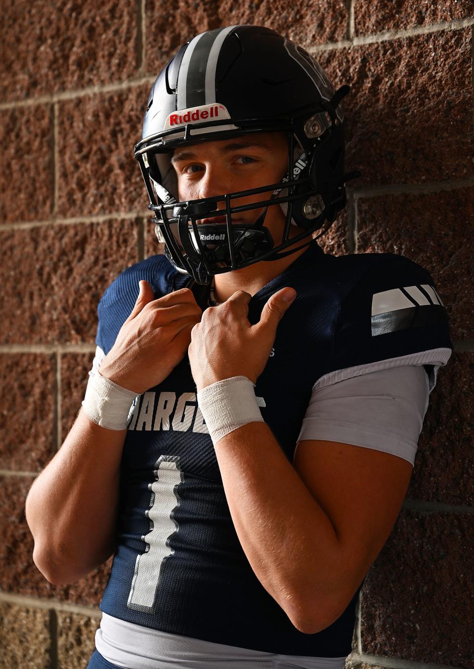 Corner Canyon’s Isaac Wilson poses for Mr. Football photos in Draper on Wednesday, Dec. 6, 2023. | Scott G Winterton, Deseret News