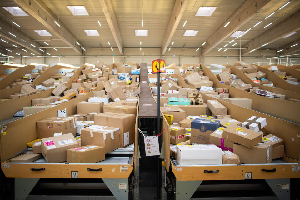 18 September 2019, Berlin: Many parcels are stored in a parcel centre run by Deutsche Post and DHL. Photo: Tom Weller/dpa (Photo by Tom Weller/picture alliance via Getty Images)