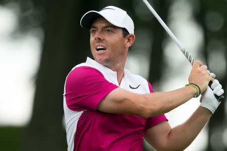 Jun 23, 2017; Cromwell, CT, USA; Rory McIlroy reacts to his drive on the 18th hole during the second round of the Travelers Championship golf tournament at TPC River Highlands. Mandatory Credit: Bill Streicher-USA TODAY Sports