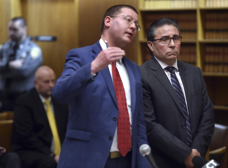 Former New Haven Police Officer Oscar Diaz, right, appears in Superior Court in New Haven on March 28, 2024, with attorney Matthew Popilowski, seeking accelerated rehabilitation for two charges related to the incident that left Richard "Randy" Cox paralyzed. The former New Haven officers' applications for a pretrial probation program were rejected Thursday in the case of Cox. (Arnold Gold/Hearst Connecticut Media via AP, Pool)