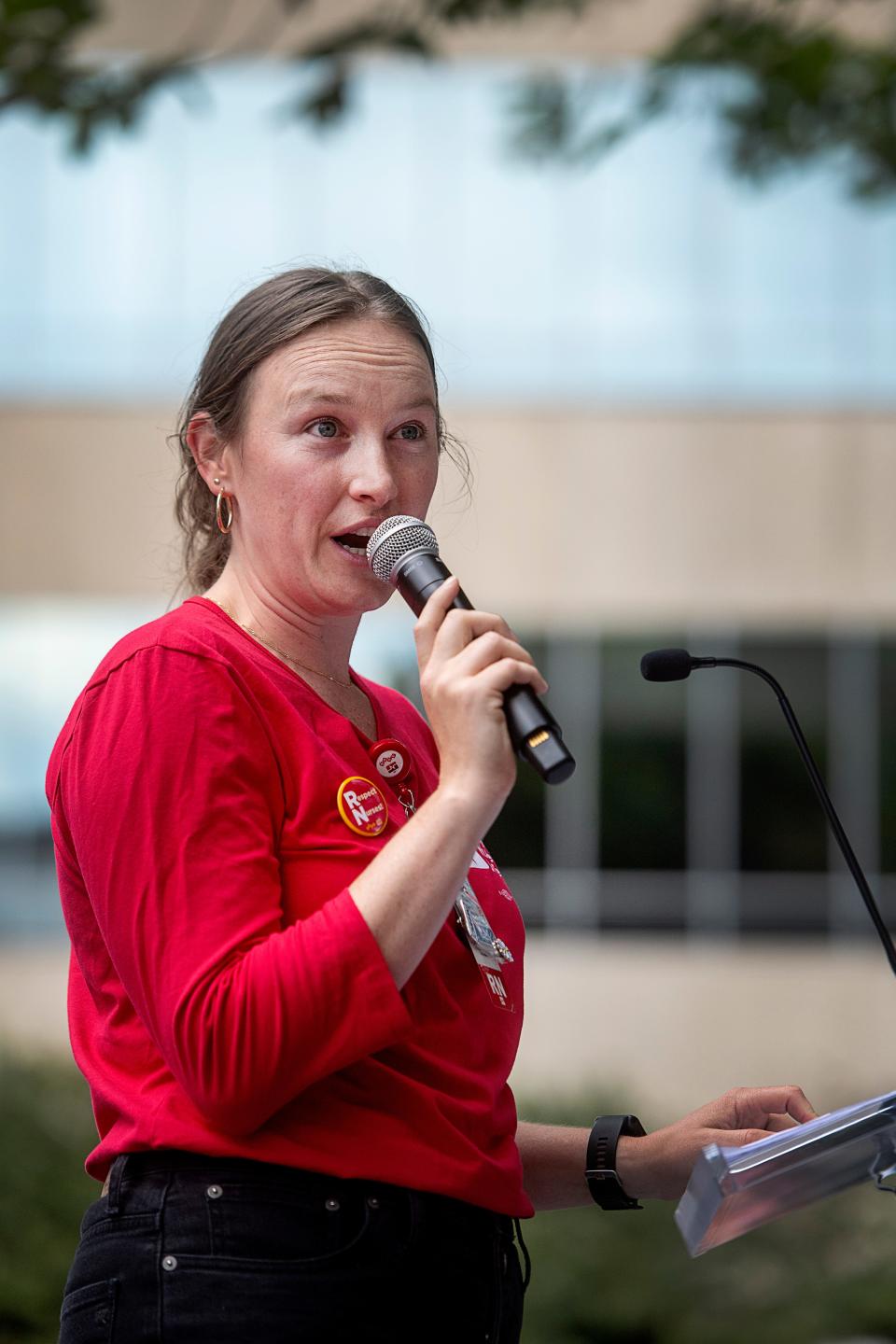 Claire Siegel, a registered nurse at Mission Health, speaks during a union rally at Pack Square, September 7, 2023.