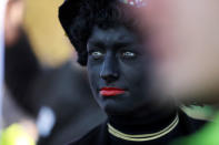 "Zwarte Piet" (Black Pete), who is a Saint Nicholas' assistant is seen during a traditional parade in Zaanstad, Netherlands, November 17, 2018. Picture taken November 17, 2018. REUTERS/Eva Plevier