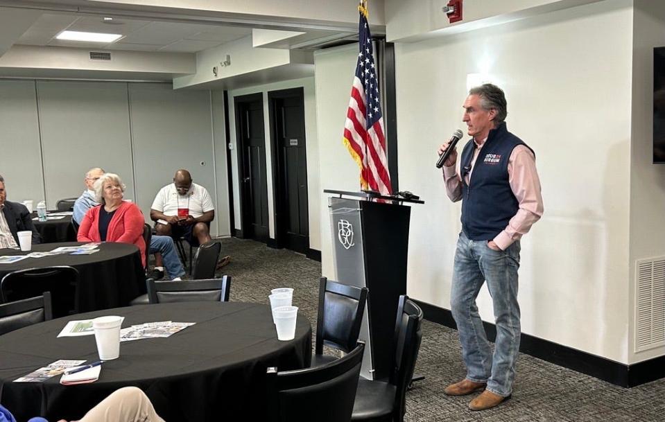 North Dakota Gov. Doug Burgum speaks to the Northside Conservative Breakfast Club in Ankeny.