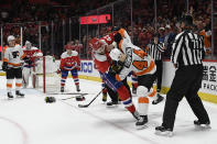 Washington Capitals right wing Tom Wilson (43) fights with Philadelphia Flyers center Nate Thompson (44) during the first period of an NHL hockey game Wednesday, March 4, 2020, in Washington. (AP Photo/Nick Wass)