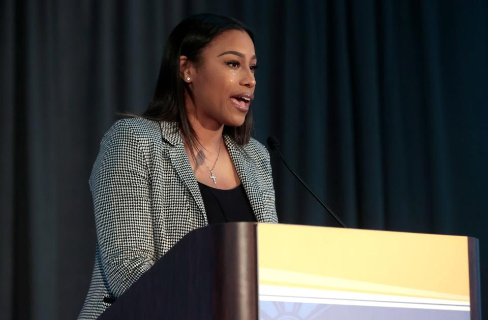 Sharnese Marshall, the founder and CEO of The Konnection and the Shining Light Dave Bing Young Leader Award winner talks to the crowd after accepting her award during the ceremony at The Mint at Michigan First Conference Center in Southfield on Thursday, October 5, 2023.