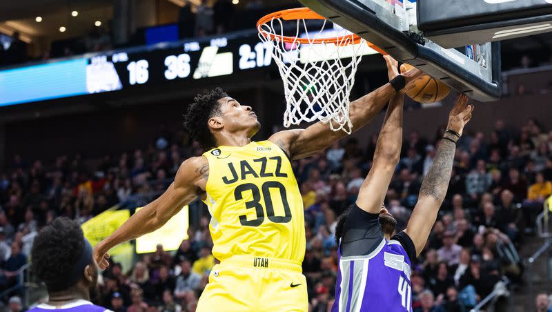 Utah Jazz guard Ochai Agbaji (30) blocks Sacramento Kings forward Trey Lyles (41) during an NBA game against the Sacramento Kings at Vivint Arena in Salt Lake City on March 20, 2023.